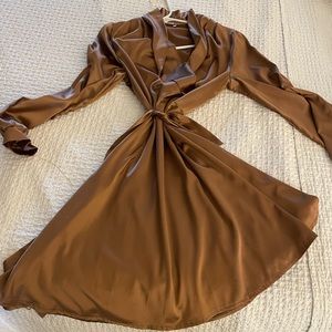 Long sleeve belted dress.